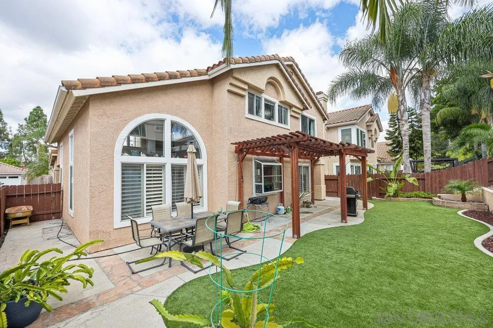 790 Mosaic Circle Oceanside, CA 92057 - Photo 44 of 47 a front view of a house with garden