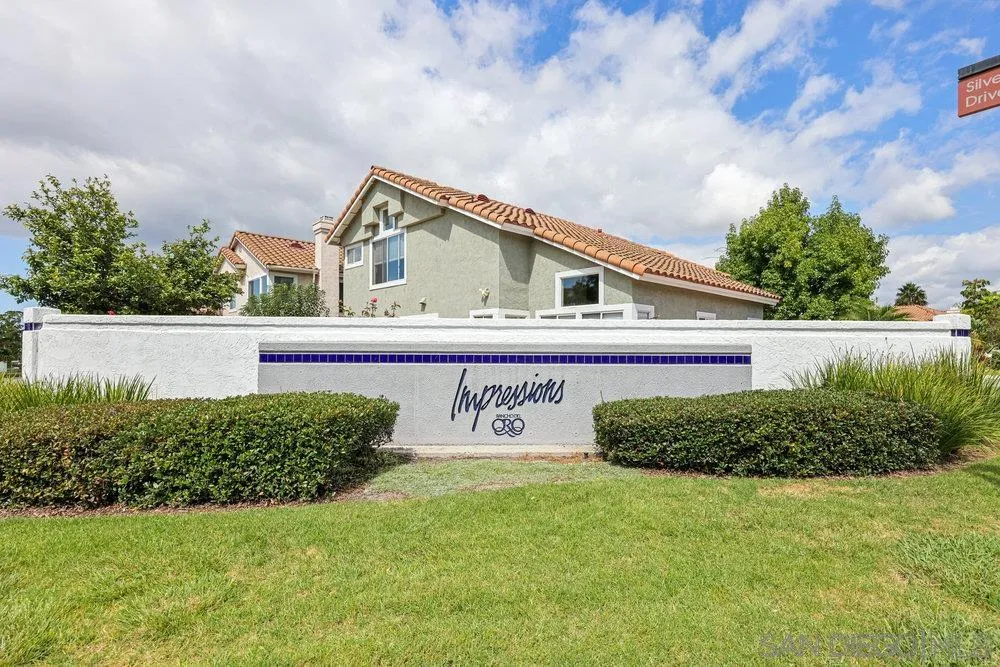 790 Mosaic Circle Oceanside, CA 92057 - Photo 46 of 47 a front view of a house with a garden
