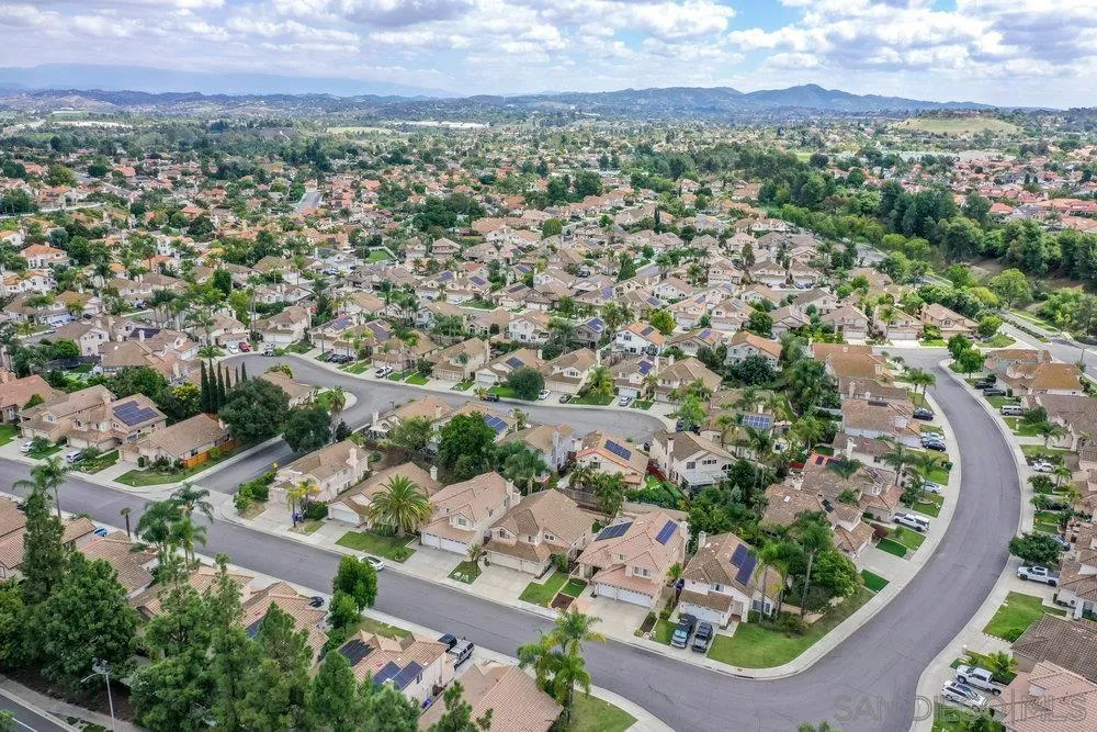 790 Mosaic Circle Oceanside, CA 92057 - Photo 6 of 47 an aerial view of a city with lots of residential buildings