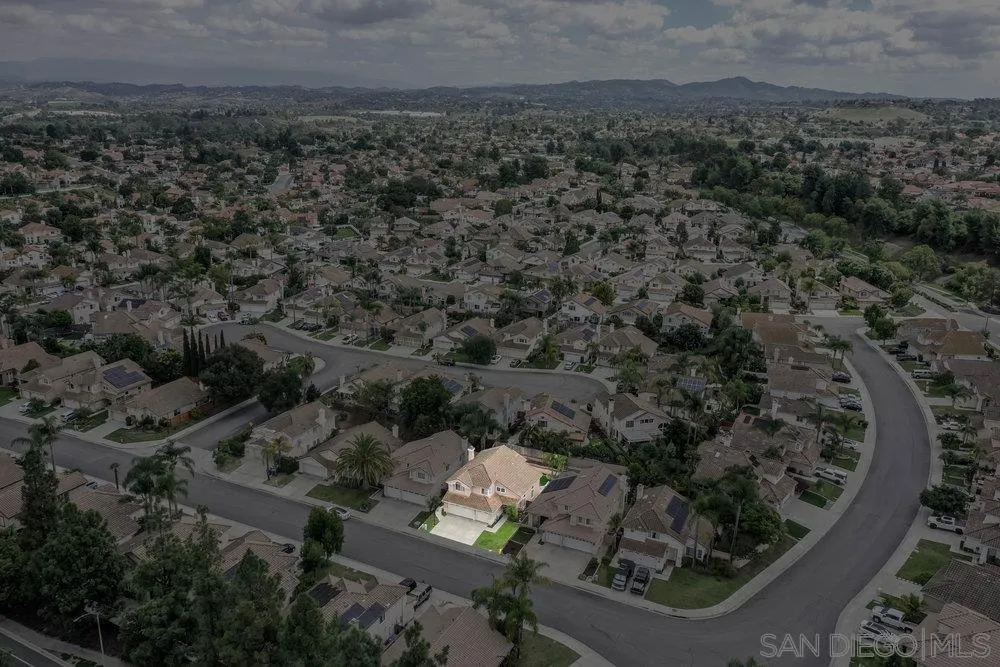 790 Mosaic Circle Oceanside, CA 92057 - Photo 7 of 47 an aerial view of a house with a yard