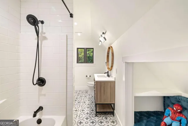 a living room with furniture a window and gym equipment