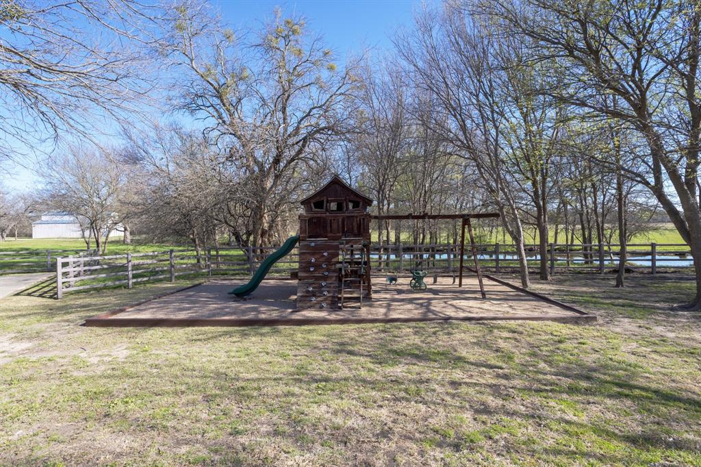 8970 Burnett Road Justin, TX 76247 - Photo 36 of 39 a view of yard with tree s