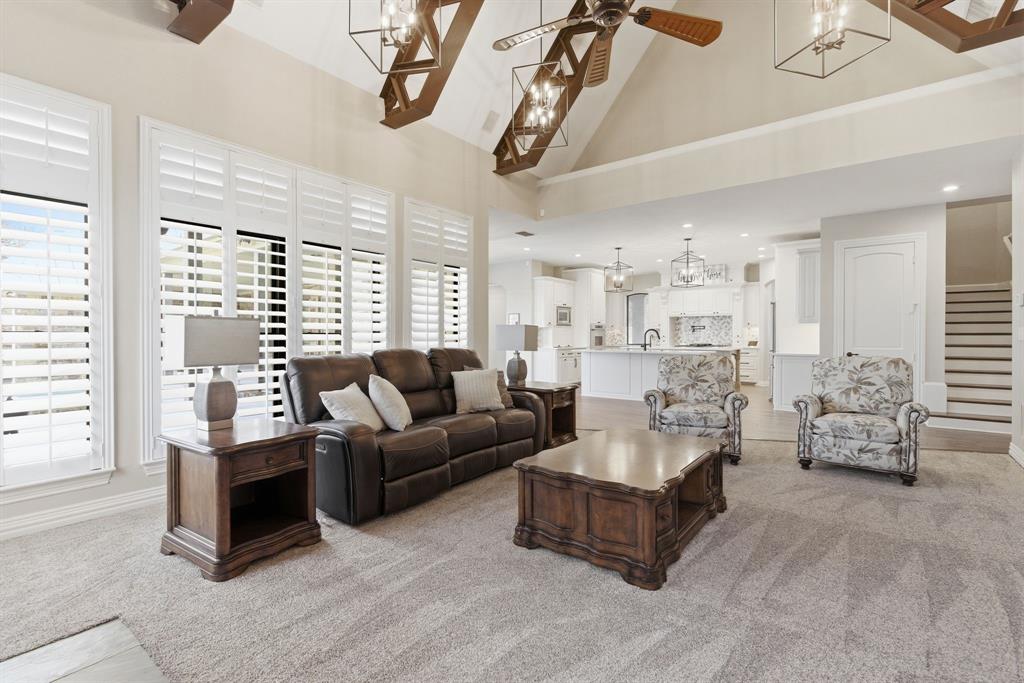 8970 Burnett Road Justin, TX 76247 - Photo 8 of 39 a living room with furniture and large windows