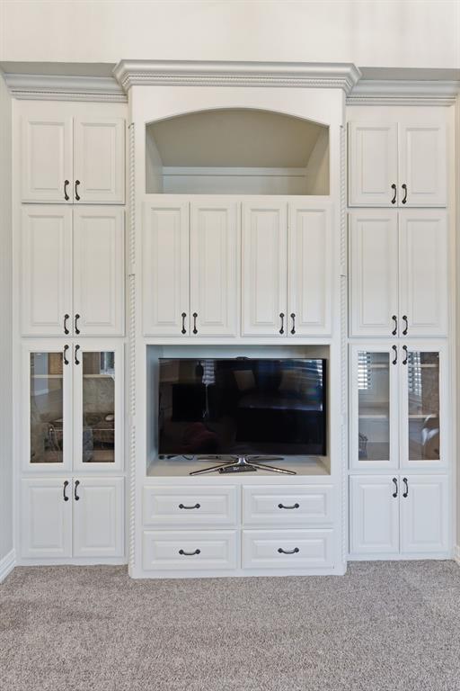 8970 Burnett Road Justin, TX 76247 - Photo 9 of 39 a kitchen with stainless steel appliances a cabinets and a stove top oven