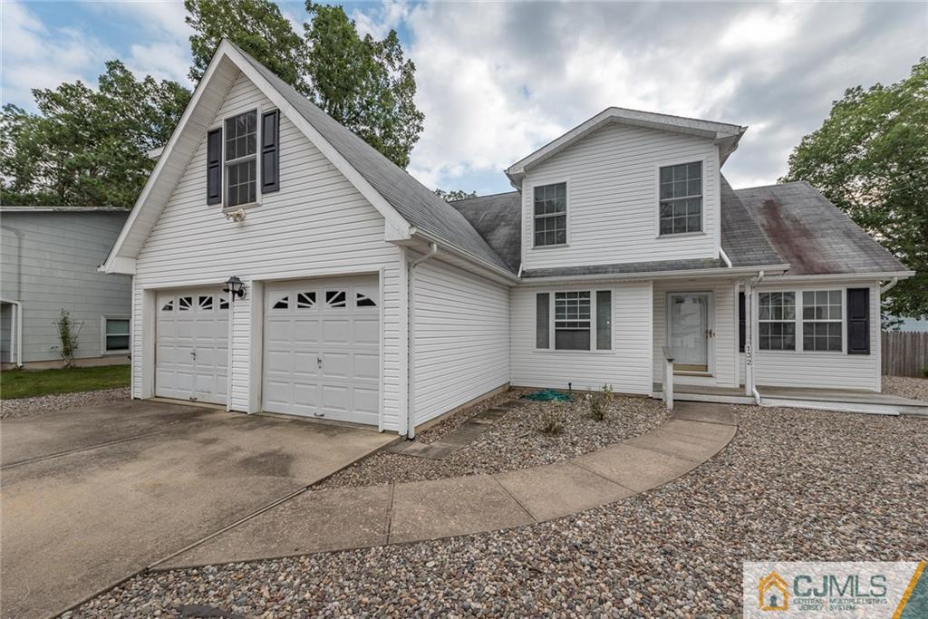 132 Launch Road Manahawkin, NJ 08050 - Photo 1 of 25 a view of a house with a yard
