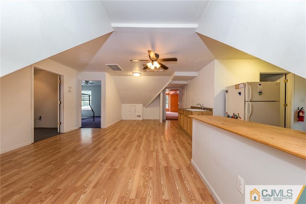 132 Launch Road Manahawkin, NJ 08050 - Photo 15 of 25 a very nice looking room with a large window