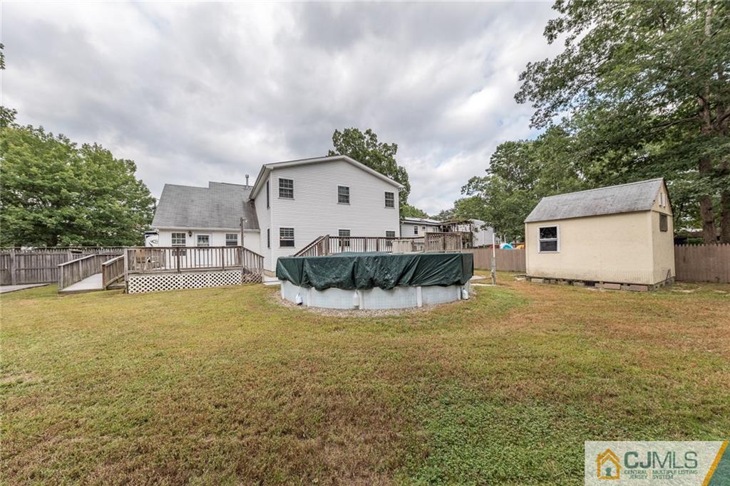 132 Launch Road Manahawkin, NJ 08050 - Photo 24 of 25 a view of a house with pool and sitting area