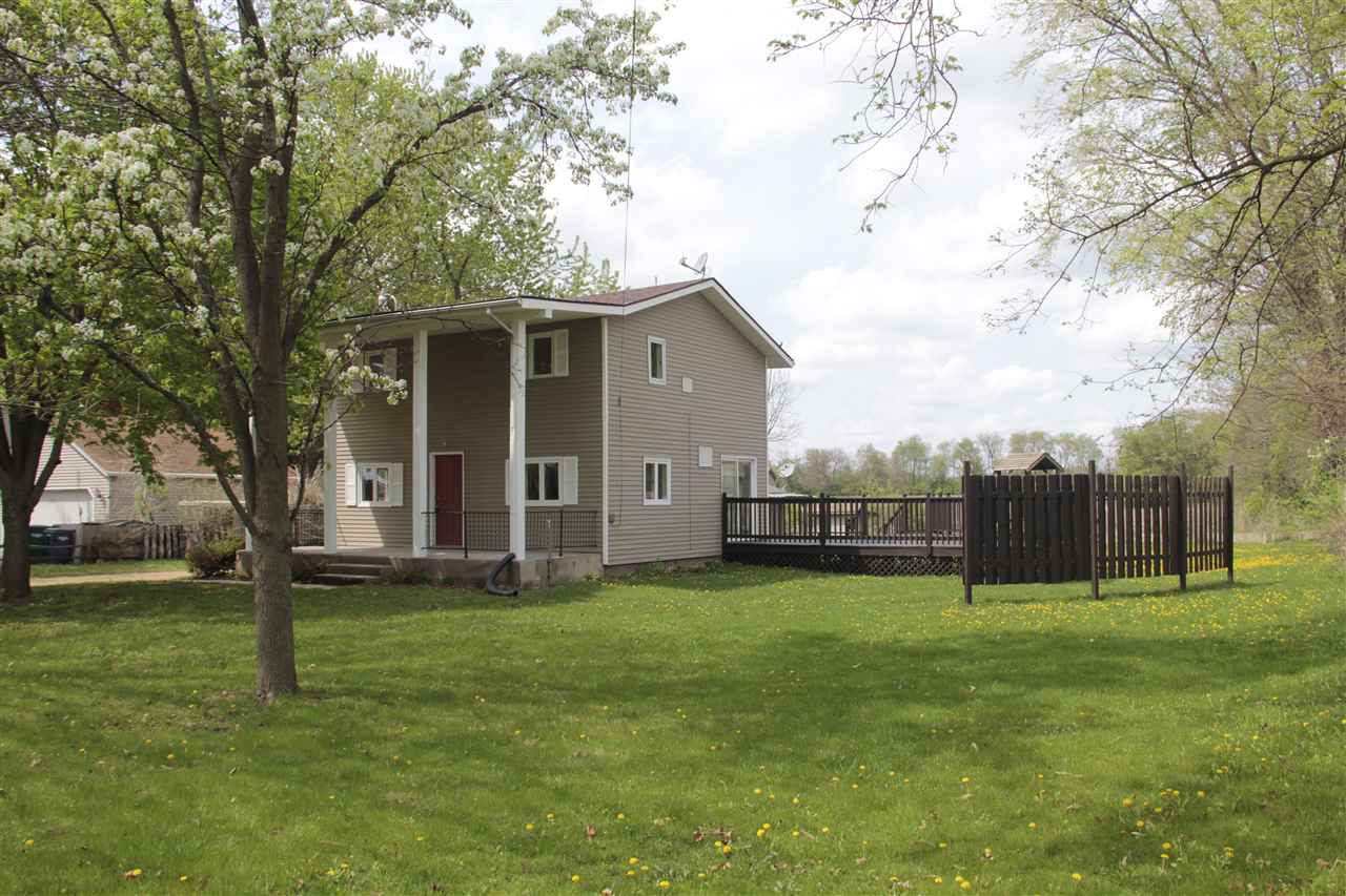 3618 Rotary Road Rockford, IL 61109 - Photo 1 of 24 a view of a house with a yard