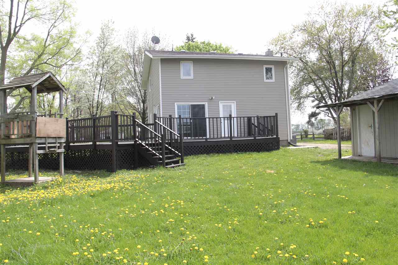 3618 Rotary Road Rockford, IL 61109 - Photo 24 of 24 a view of a house with a yard and sitting area