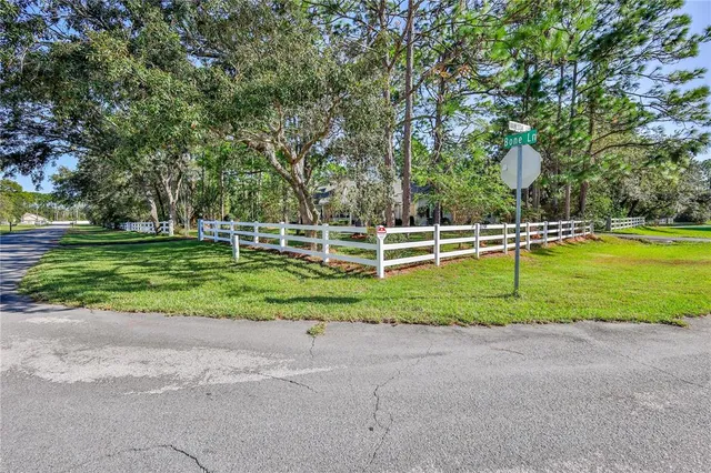 a view of a workspace with furniture and staircase