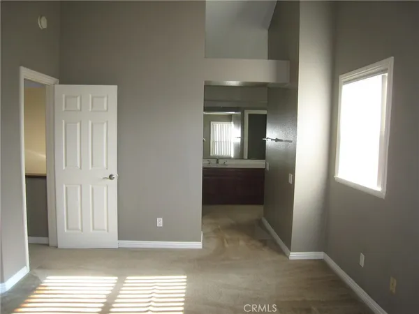 a bathroom with a bathtub and a sink