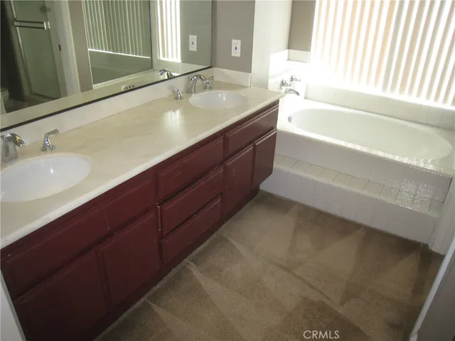 a bathroom with a toilet and a sink