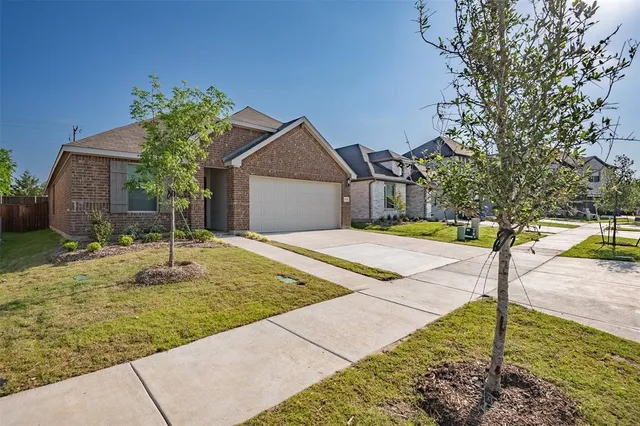 a swimming pool with some trees in the background