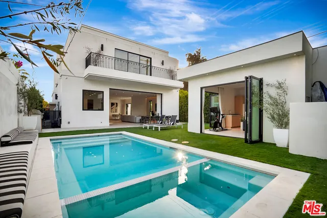 a view of a house with a swimming pool