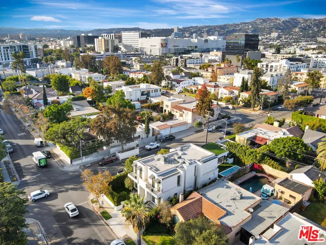 an aerial view of a house with a garden