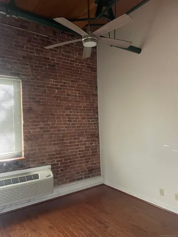 a view of walk in closet with window