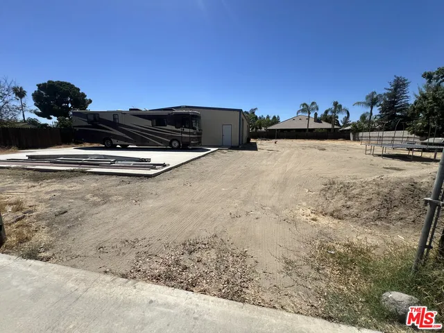 a side view of a house with a garage