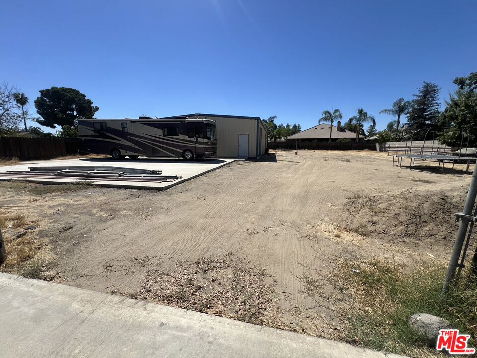 10931 Shellabarger Road Bakersfield, CA 93312 - Photo 34 of 44 a view of terrace with wooden floor and city view