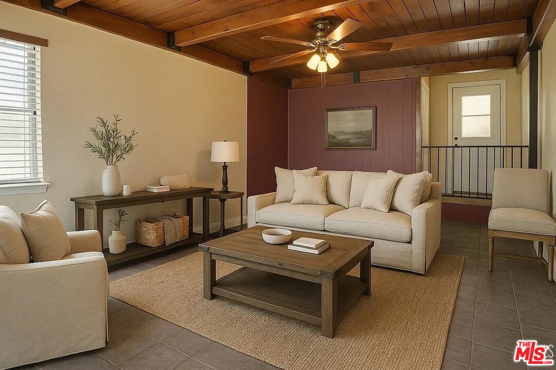 10931 Shellabarger Road Bakersfield, CA 93312 - Photo 4 of 44 a living room with furniture and a ceiling fan