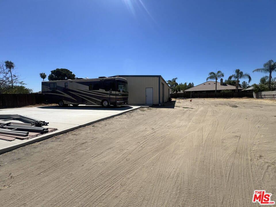 10931 Shellabarger Road Bakersfield, CA 93312 - Photo 41 of 44 a view of a terrace with wooden floor and city view
