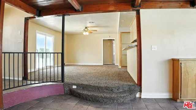 a view of a bathroom with a glass door