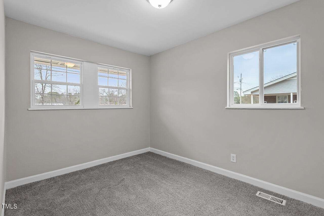 1610 Crescent Drive Spring Lake, NC 28390 - Photo 12 of 21 an empty room with a window