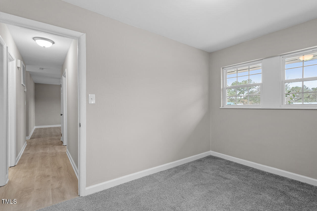 1610 Crescent Drive Spring Lake, NC 28390 - Photo 15 of 21 an empty room with windows