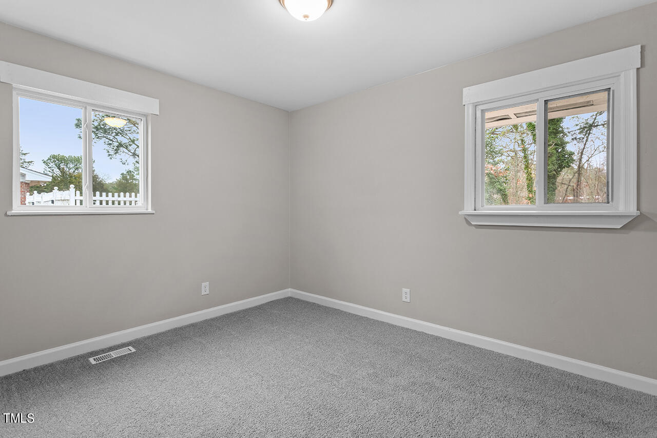 1610 Crescent Drive Spring Lake, NC 28390 - Photo 16 of 21 an empty room with a window