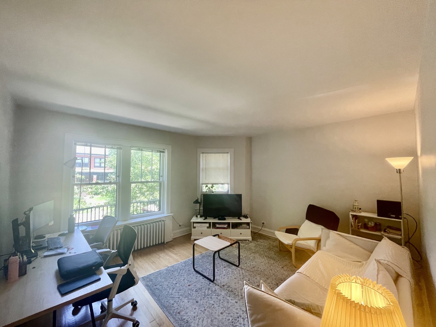 1112 Grove Street, Unit 1B Evanston, IL 60201 - Photo 3 of 14 a living room with furniture and a window