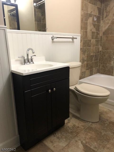 32 West Maple Avenue Bound Brook, NJ 08805 - Photo 10 of 12 a bathroom with a sink and a toilet