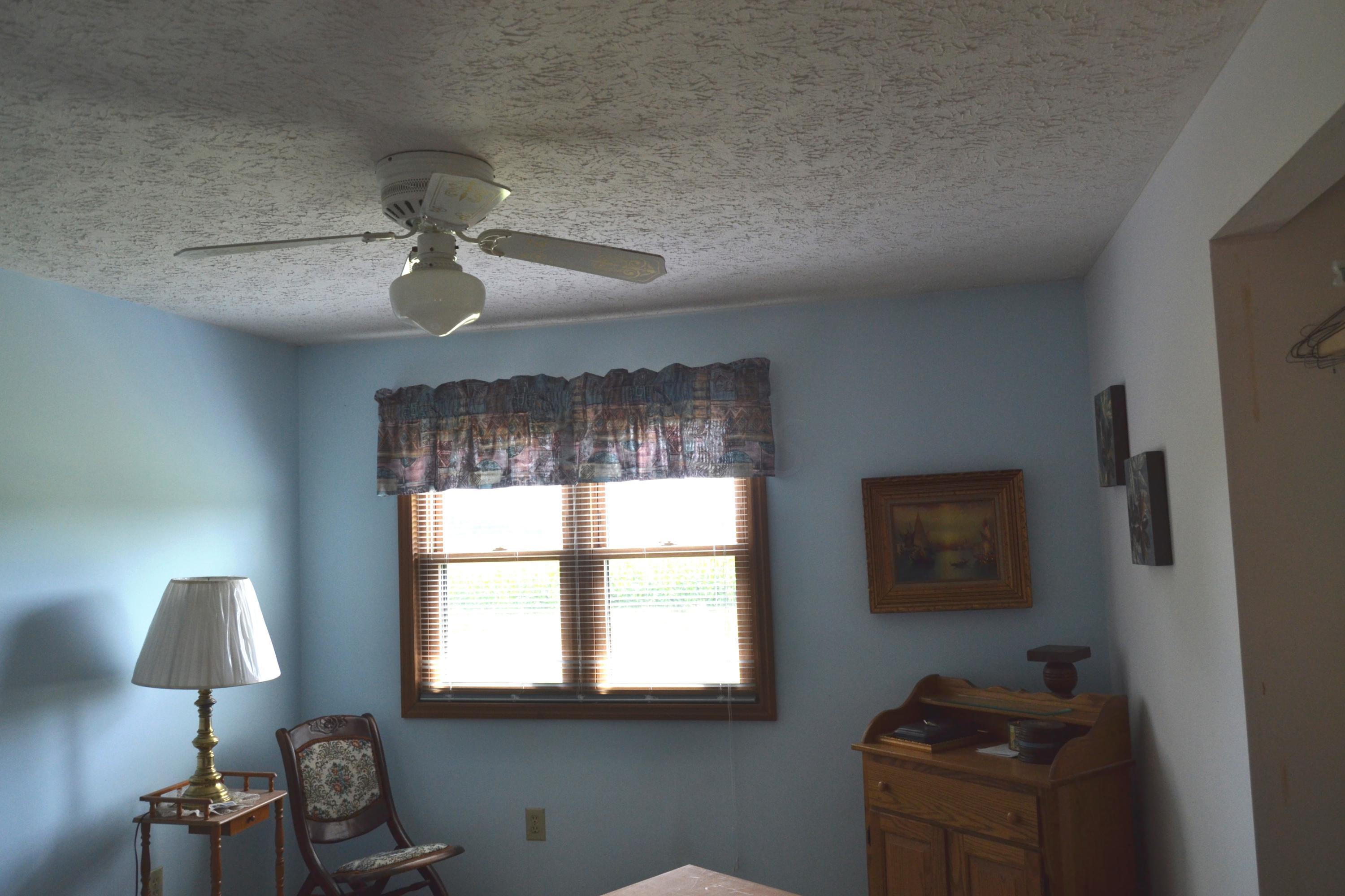 9000 Welsh Road Radnor, OH 43066 - Photo 15 of 28 10'0 x 14'0 Upper level bedroom with lighted ceiling fan.