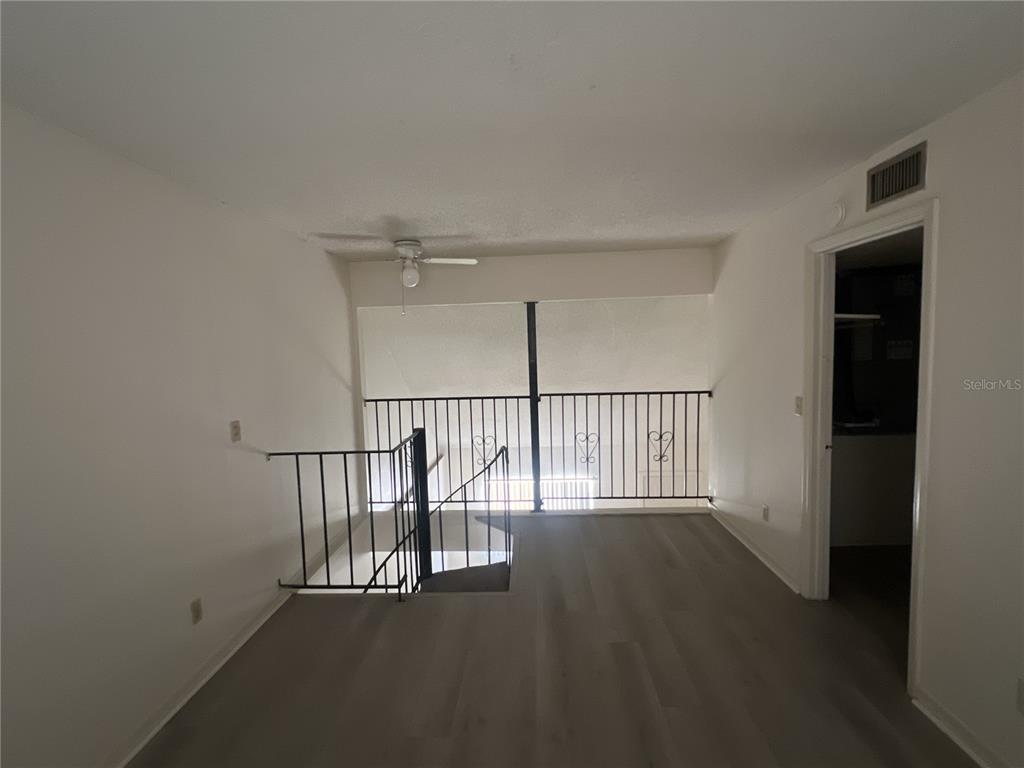 11558 Southeast 58th Avenue Belleview, FL 34420 - Photo 23 of 26 a view of entryway with wooden floor