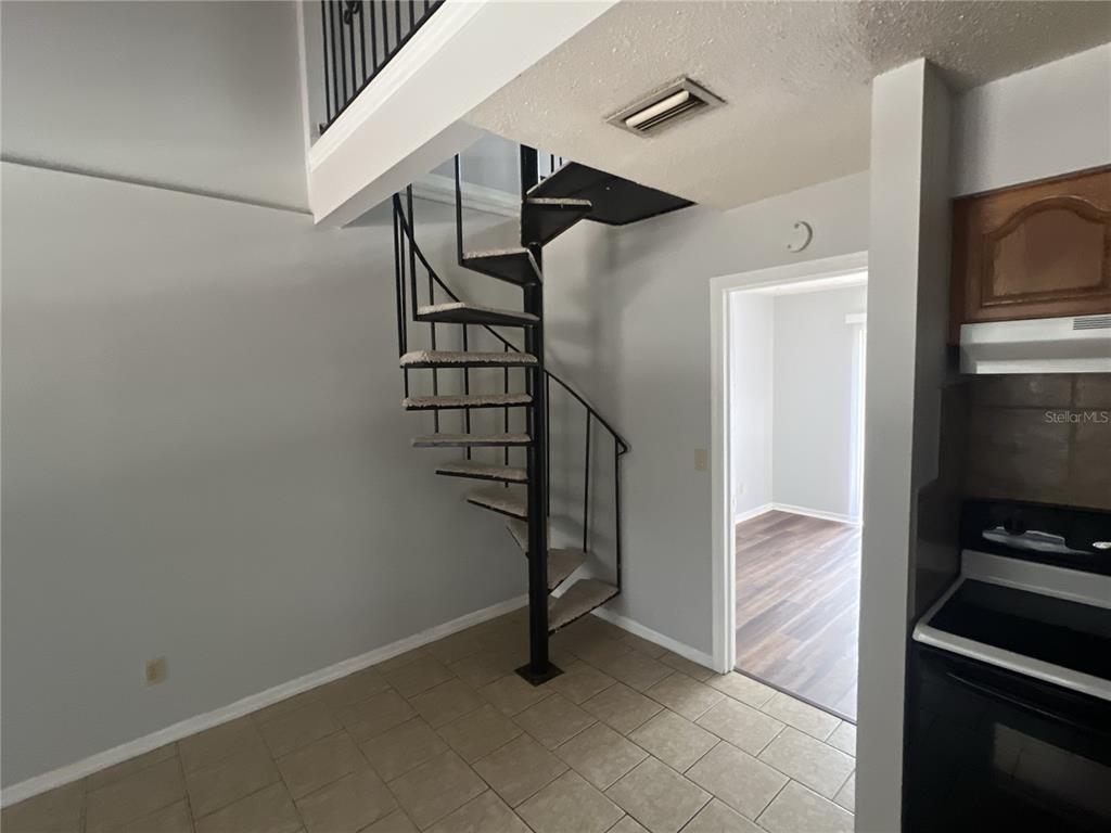 11558 Southeast 58th Avenue Belleview, FL 34420 - Photo 4 of 26 a view of entryway and hall with wooden floor
