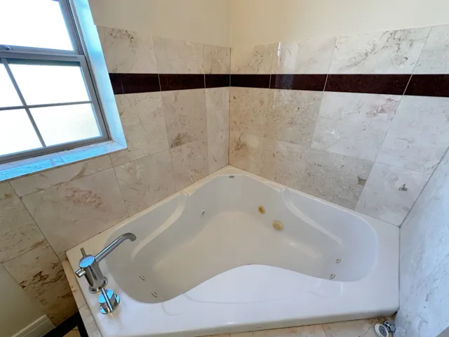 a bathroom with a bathtub