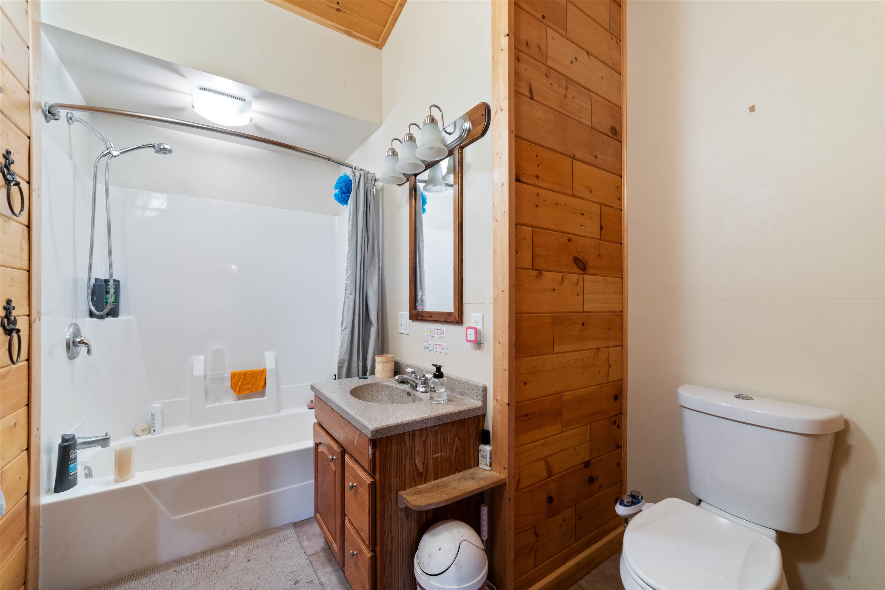 4767 McComber Road Duluth, MN 55803 - Photo 12 of 26 Bathroom featuring vanity and shower / bath combination with curtain