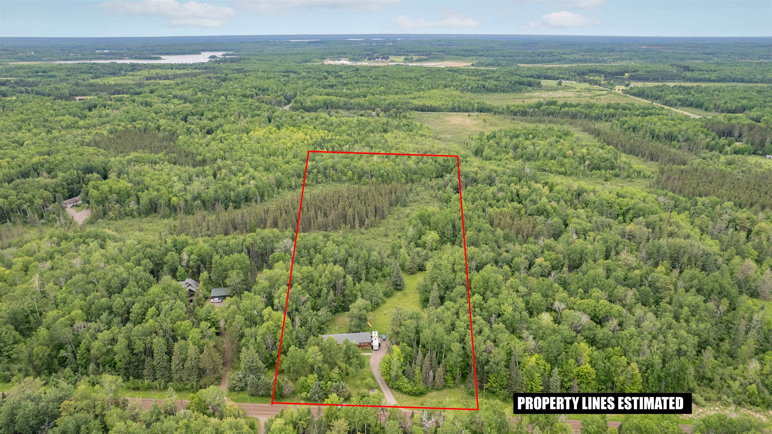 4767 McComber Road Duluth, MN 55803 - Photo 14 of 26 Aerial overview of property's location featuring a heavily wooded area and property parcel outlined