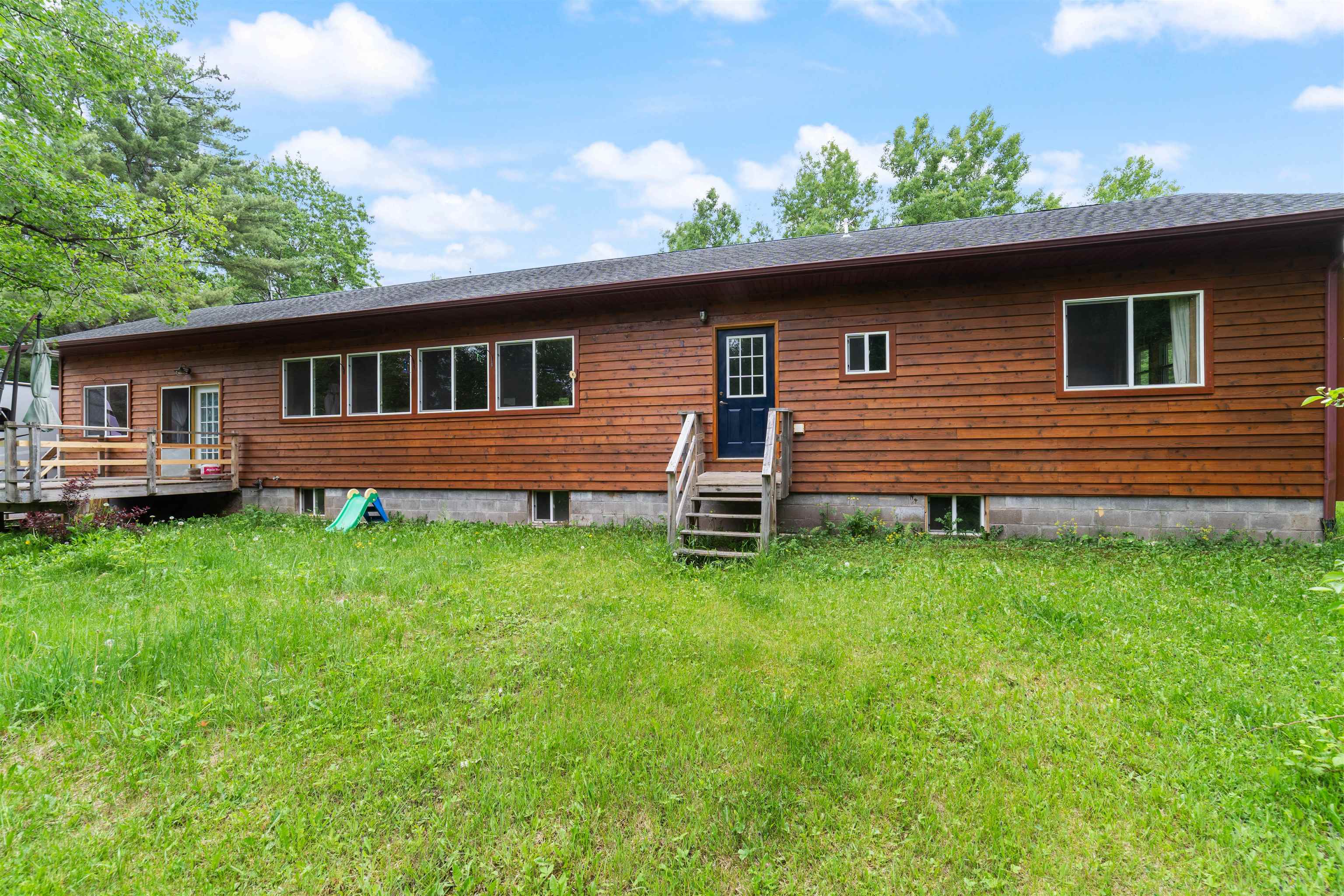 4767 McComber Road Duluth, MN 55803 - Photo 2 of 26 Back of house with a wooden deck