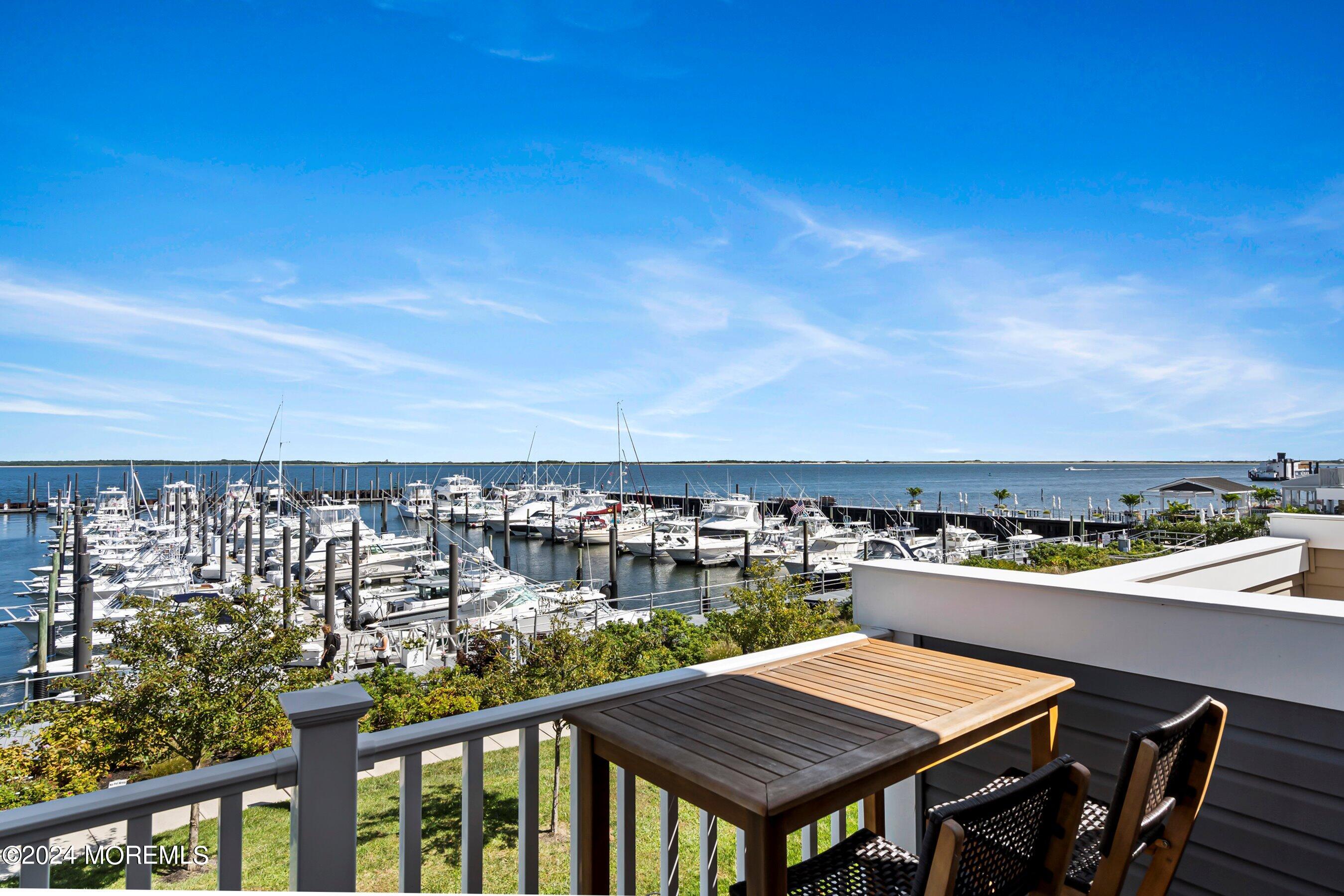 4 Halfmoon Court, Unit 904 Highlands, NJ 07732 - Photo 5 of 37 Family room view balconyferry view