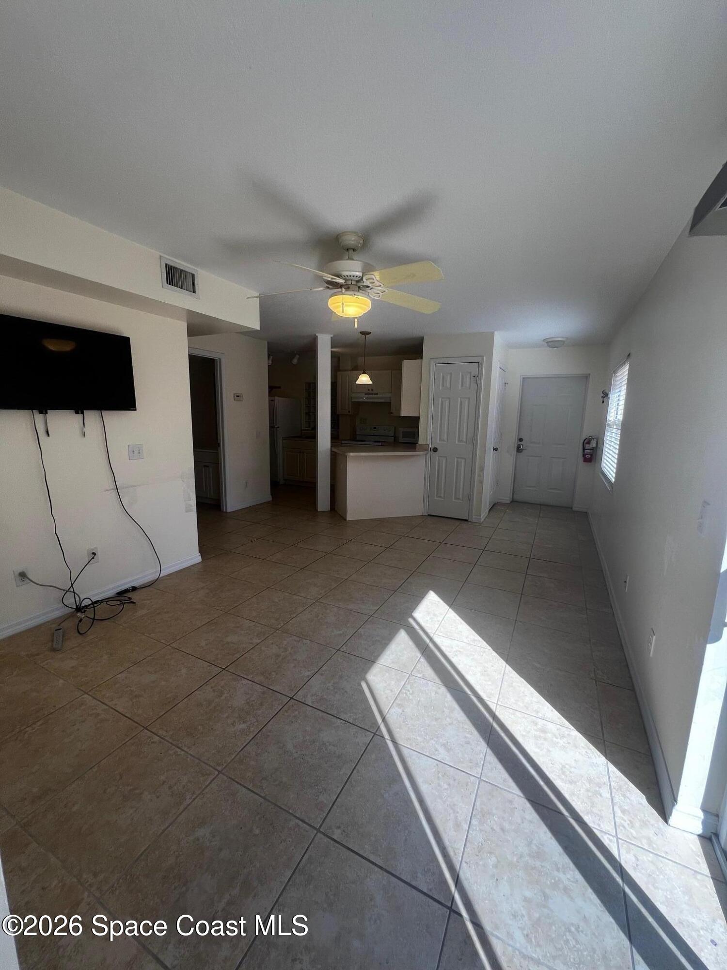 11195 Roseland Road, Unit 4 Sebastian, FL 32958 - Photo 7 of 15 IMG_2413