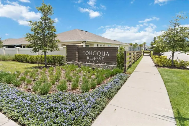 a view of a street with a building in the background