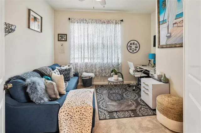 a living room with furniture and a window