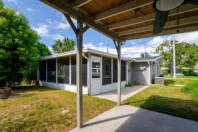 a view of a house with a yard balcony