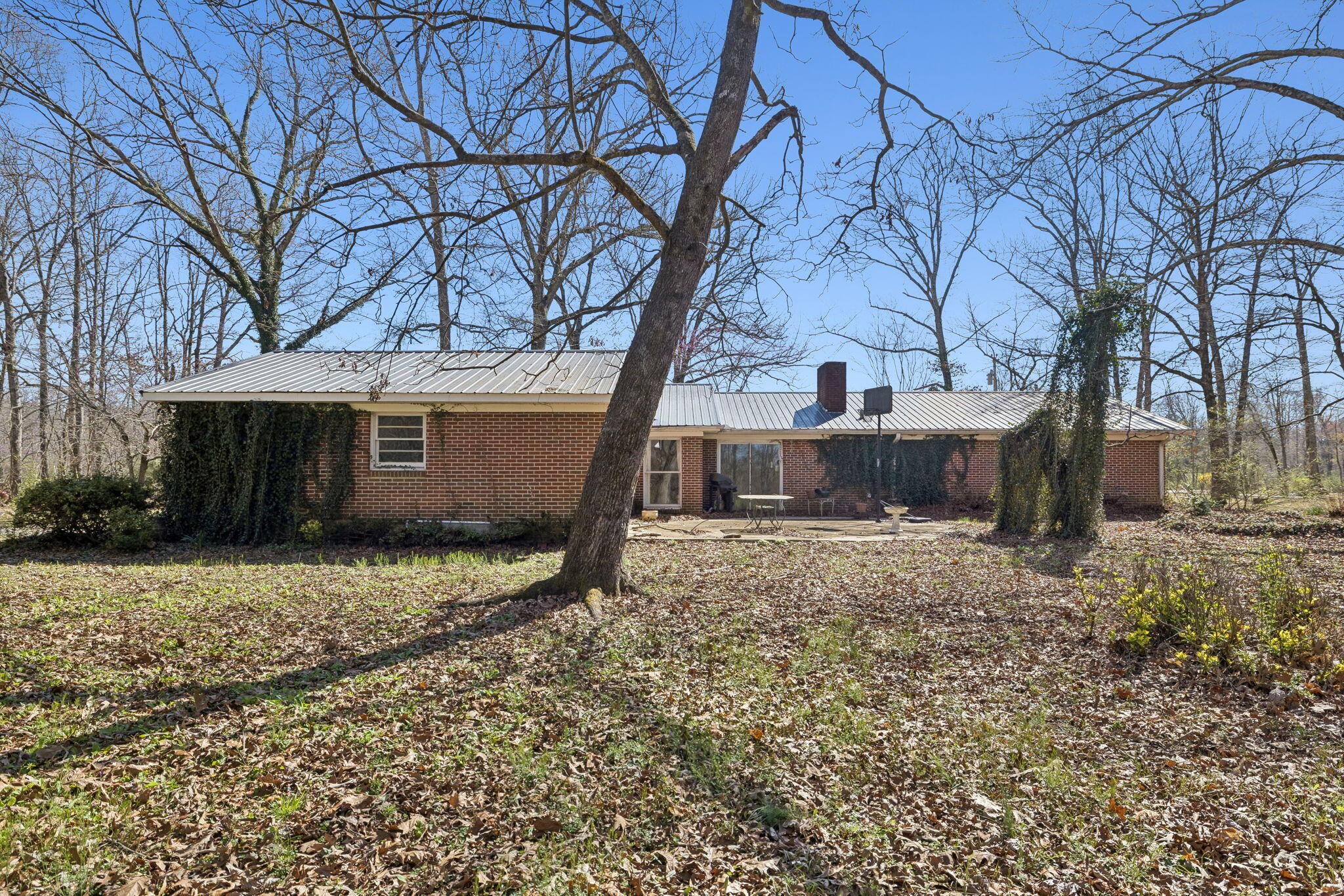 766 Bowling Alley Road Manchester, TN 37355 - Photo 45 of 57 a view of a house with a yard covered in snow