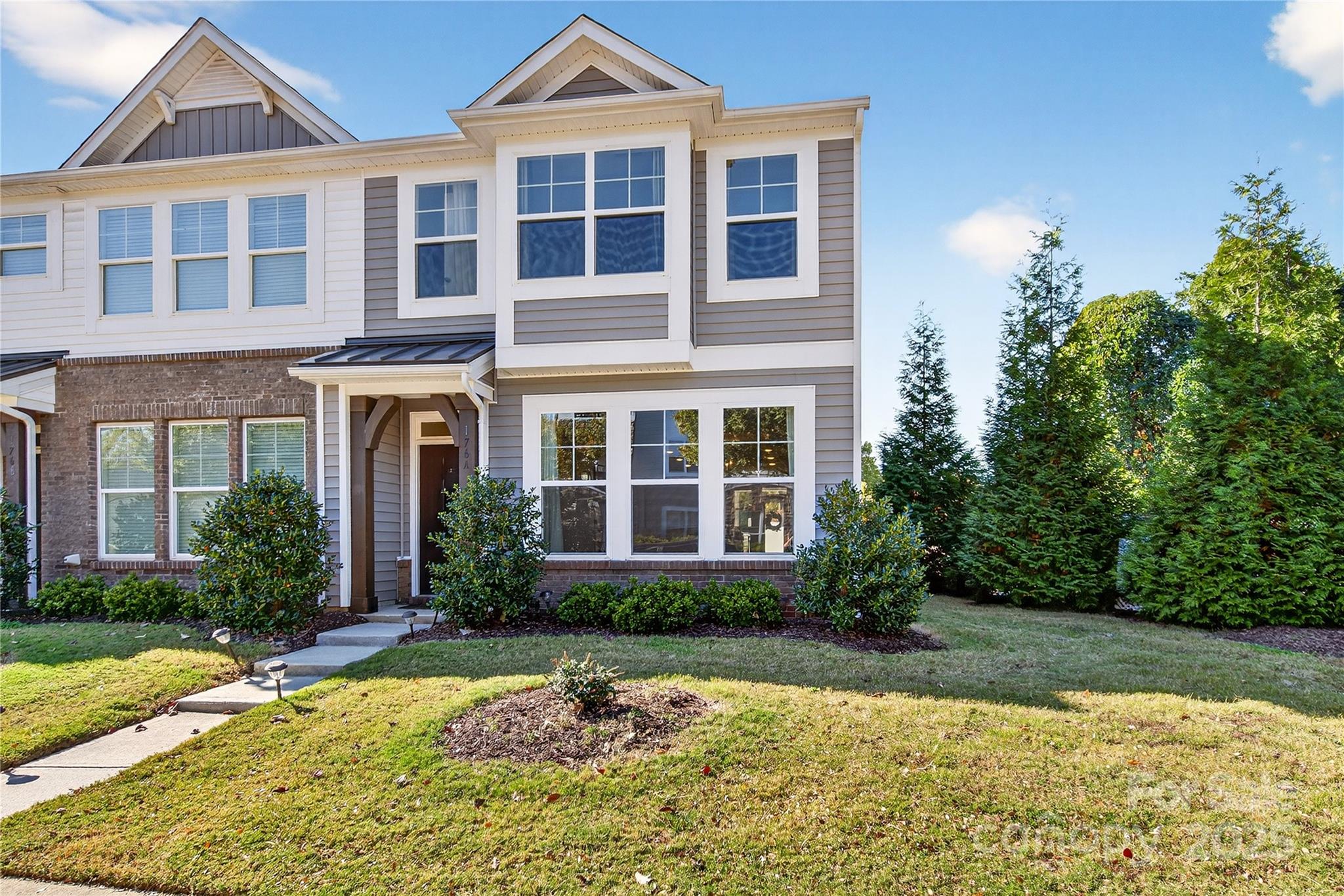 front view of a house with a yard