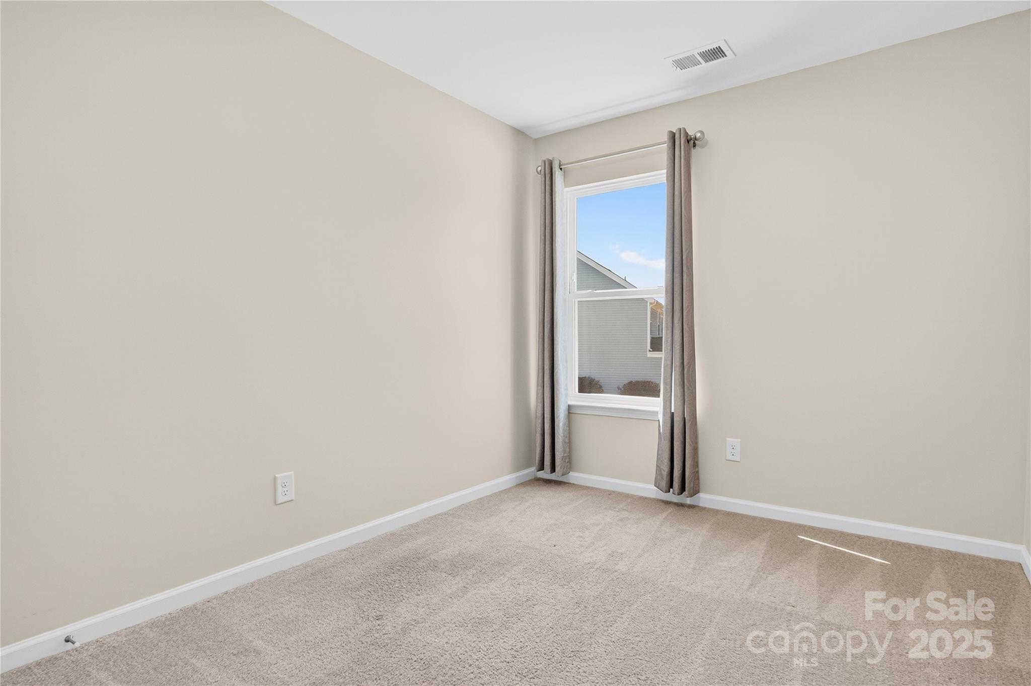 176 Waterlynn Ridge Road Mooresville, NC 28117 - Photo 23 of 25 a view of a room and window