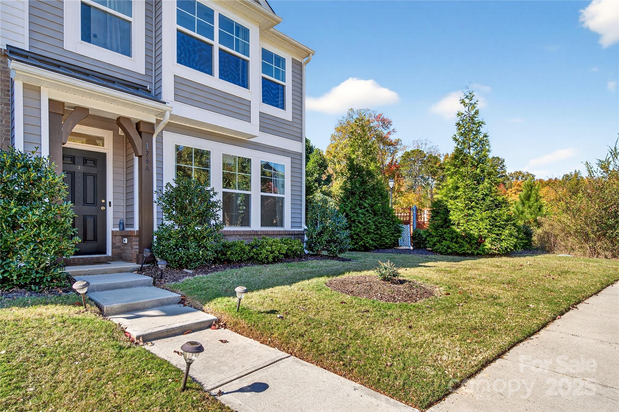 176 Waterlynn Ridge Road Mooresville, NC 28117 - Photo 3 of 25 front view of a house with a yard