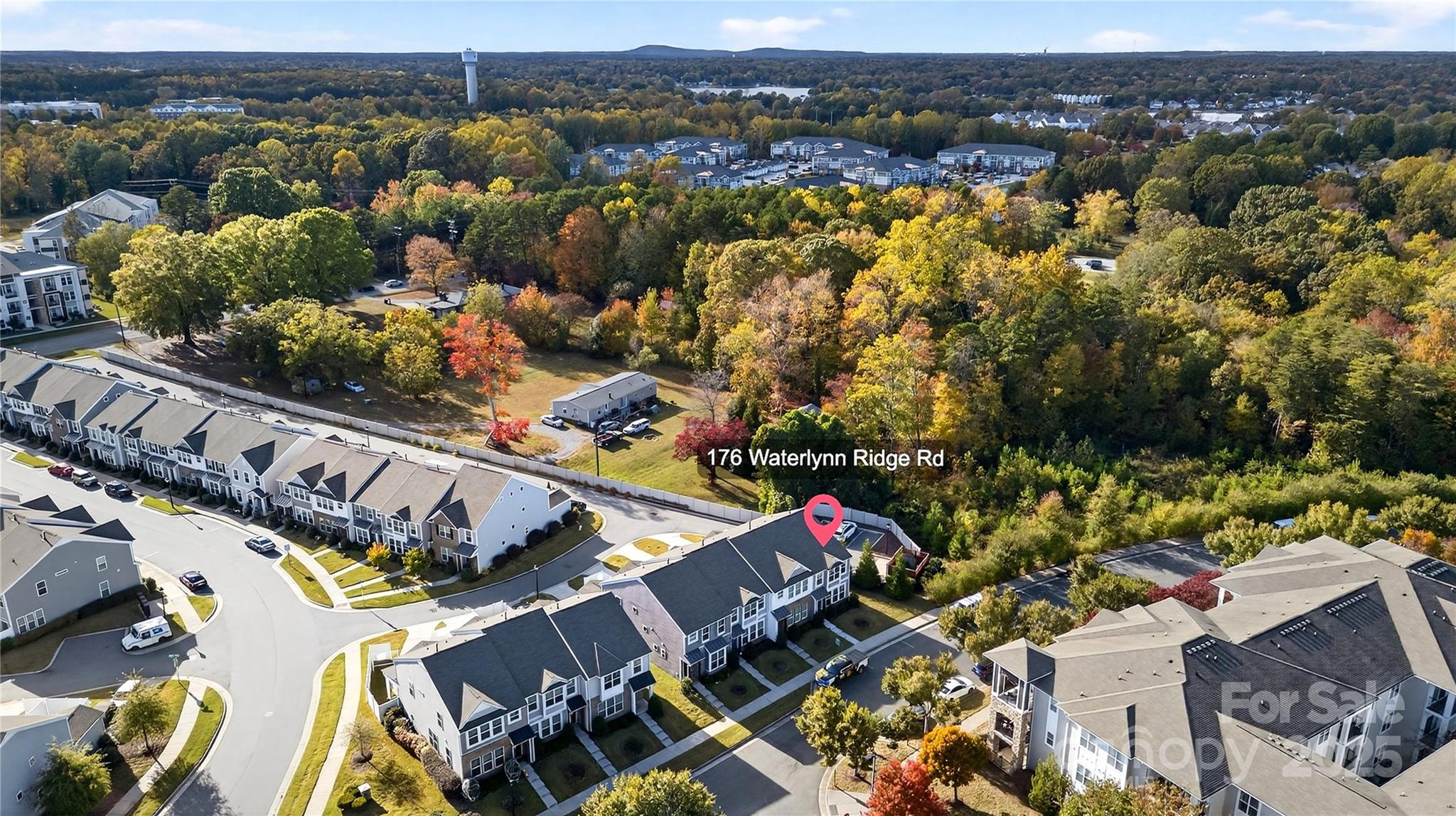 176 Waterlynn Ridge Road Mooresville, NC 28117 - Photo 4 of 25 an aerial view of a city