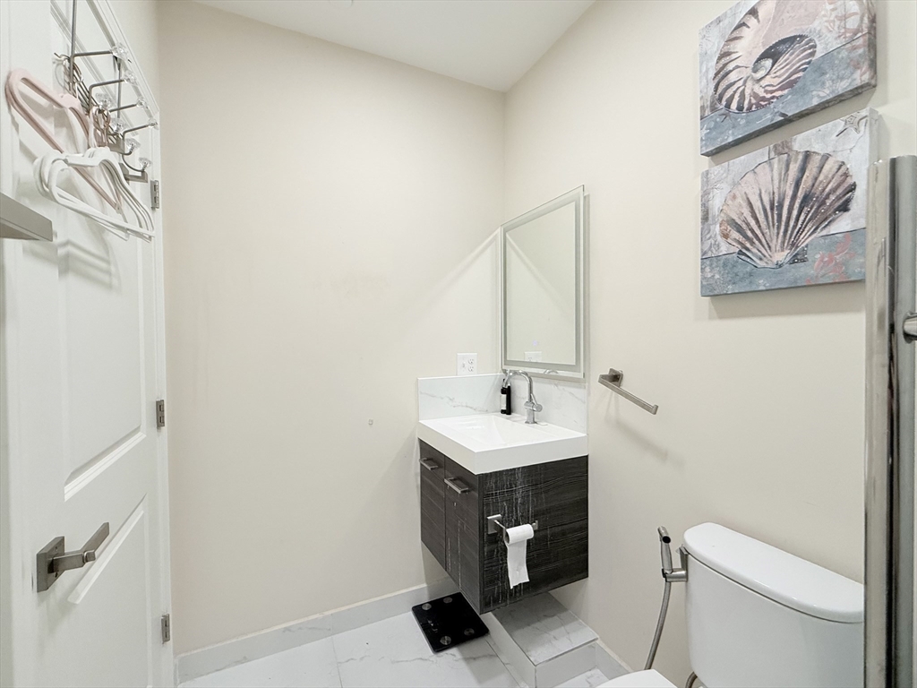 16 Taber Street, Unit 203 Boston, MA 02119 - Photo 16 of 26