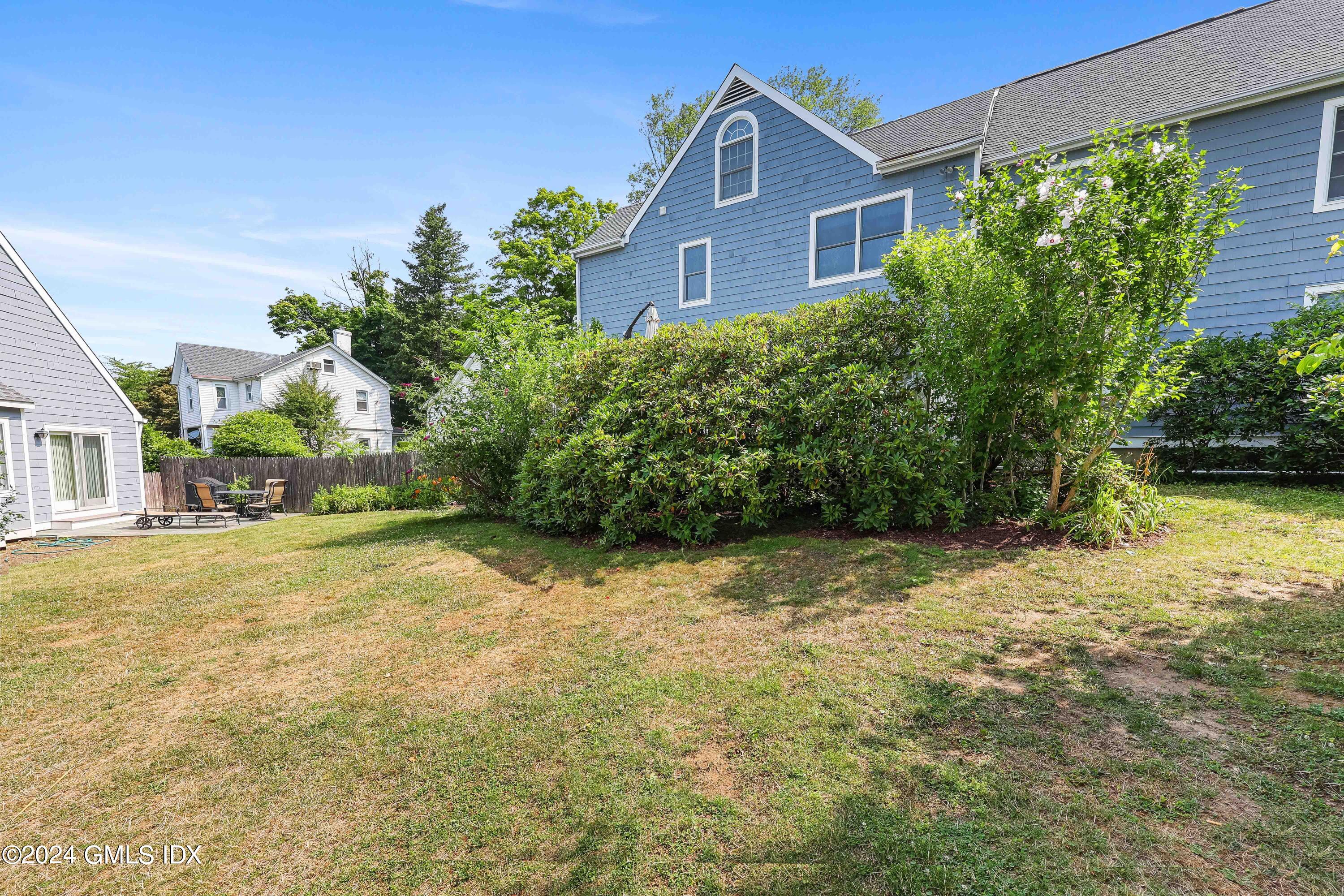 138 Byram Road, Unit 1 Greenwich, CT 06830 - Photo 32 of 36 a house view with a outdoor space