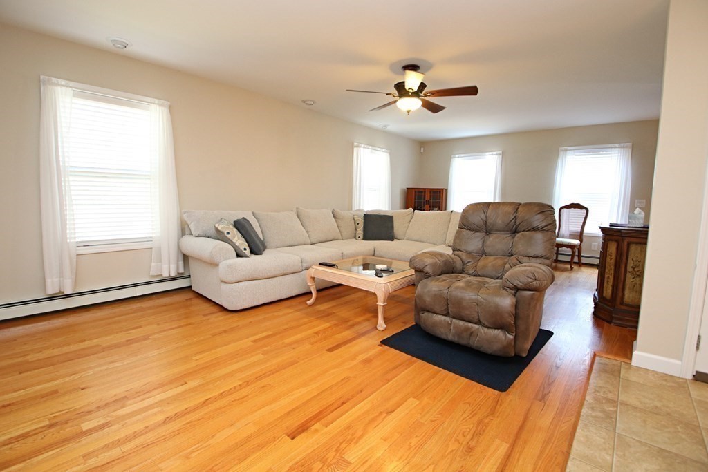 10 Pace Road Saugus, MA 01906 - Photo 12 of 42 a living room with furniture and a large window